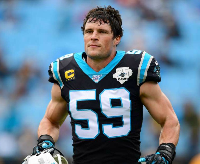 Luke Kuechly playing for his team