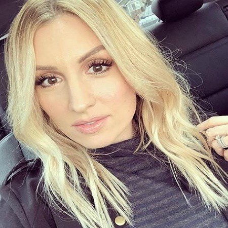 Destiny Bartels clicking selfie inside the car