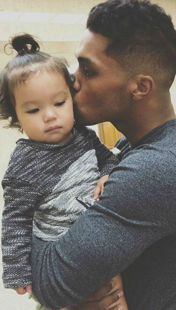 Kimiko Flynn's father Rome kissing his daughter