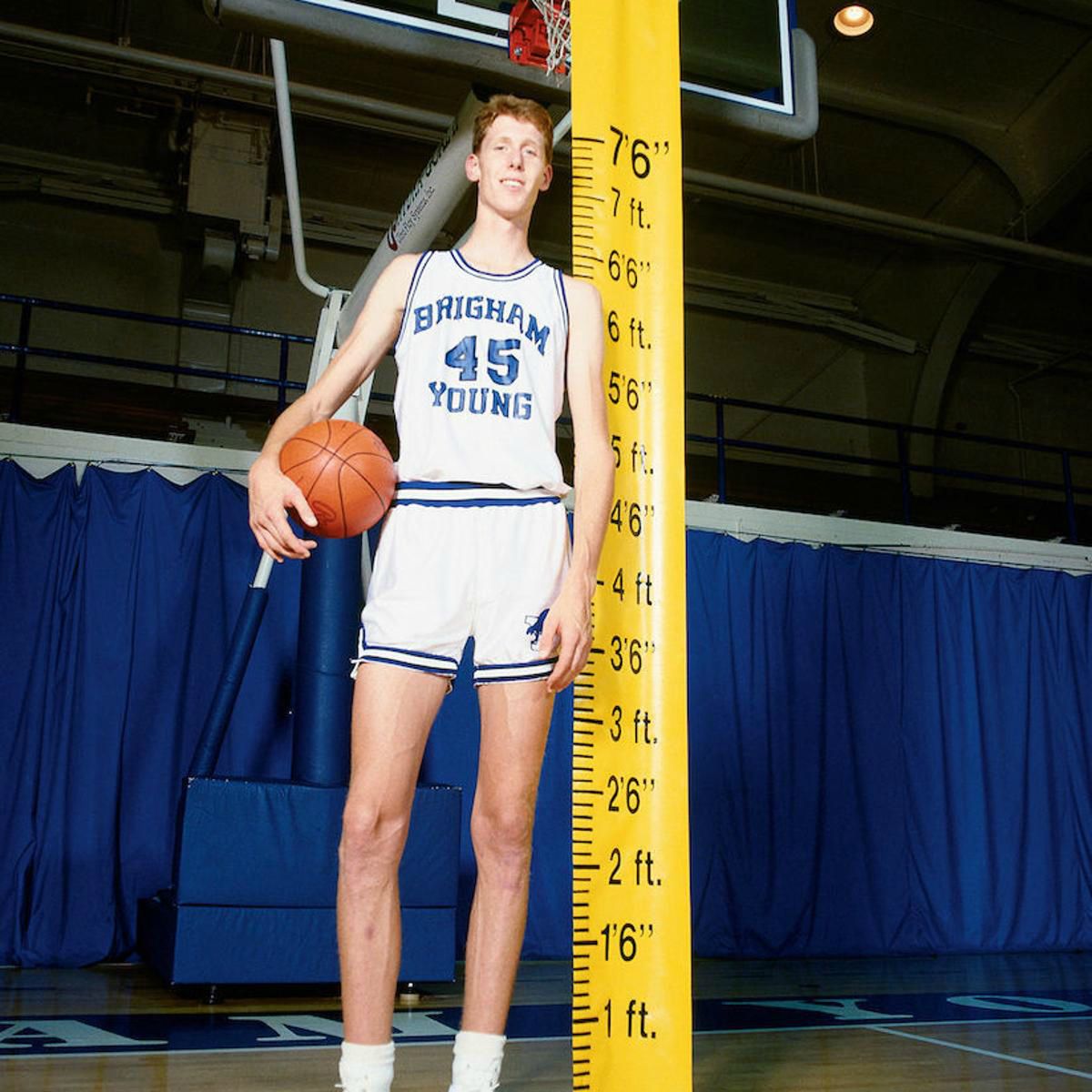 Annette Evertson's husband Shawn measuring his height