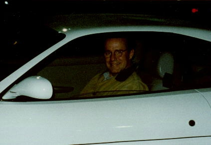 Sean Edward Hartman's father Phil sitting inside his car