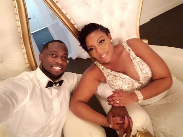 Derrick Jaxn clicking selfie with his wife Da’Naia in their wedding dress
