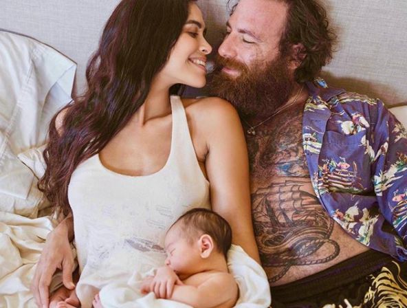 Kimberly Snyder with her husband and their son