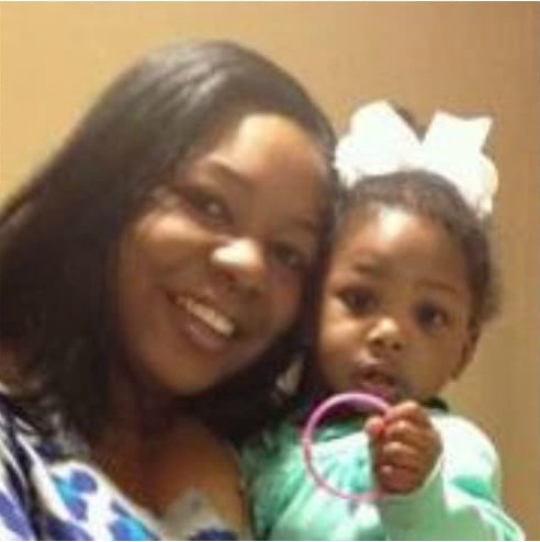 Jessica Scales-Wilder clicking picture with her daughter