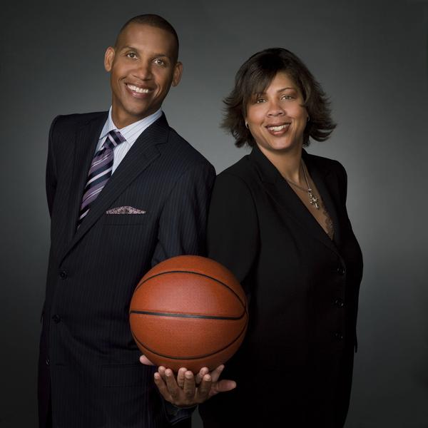 Cheryl Miller posing for a photo with her brother Reggie Miller 