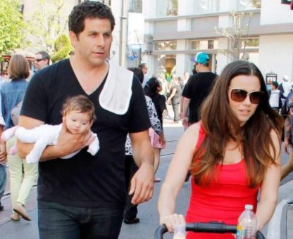 Linda Cardellini with her partner and their daughter
