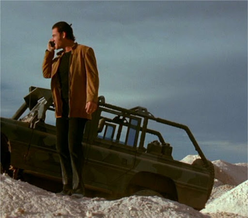 Marton Csokas acting in the movie with car in the background