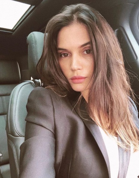 Rose Costa clicking selfie sitting inside car