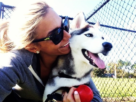 Kara Kilfoile clicking selfie with dog