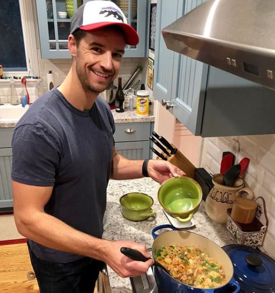 Joshua Snyder cooking the food