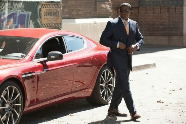 Wesley Snipes coming out of his car