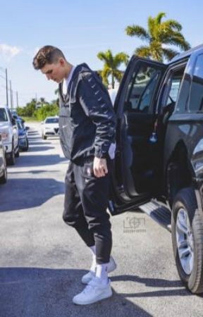 Tyler Herro coming out of his car