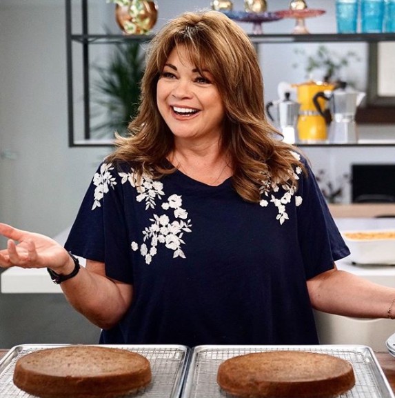 Valerie Bertinelli working in the cooking show