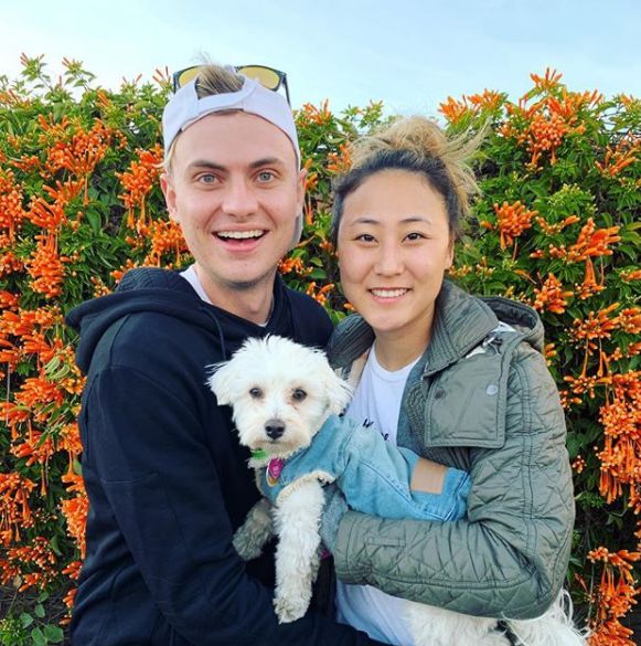 Carter Sharer with his girlfriend and their dog