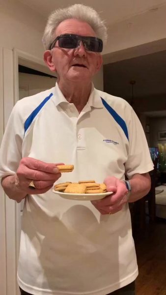 Grandad Frank making TikTok with cookies in Plate