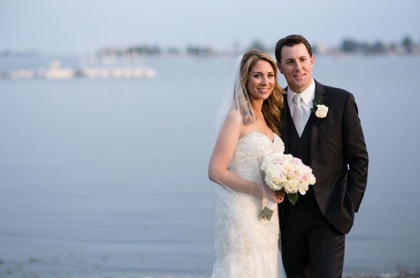 Todd Piro with his wife Amanda Raus in their wedding dress