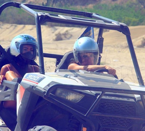 Christina Evangeline riding sand bike
