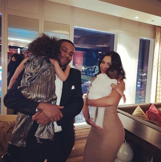 Christina Evangeline and her husband with their daughters