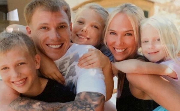 Denika Kisty with her husband Jason and their kids
