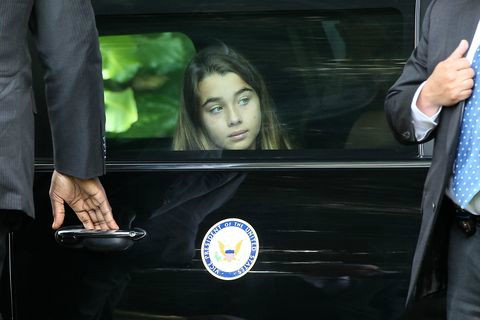 Natalie Biden sitting inside the car