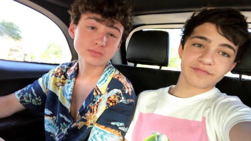 Bryce Gheisar clicking selfie sitting inside the car
