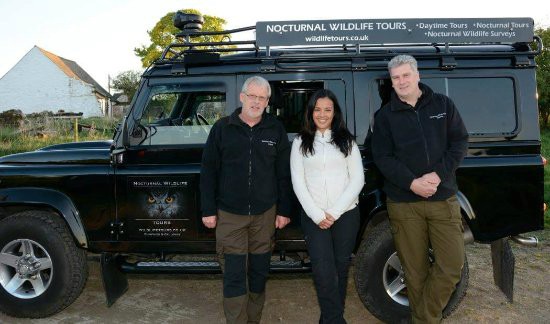 Liz Bonnin posing for photo with Jeep in the background