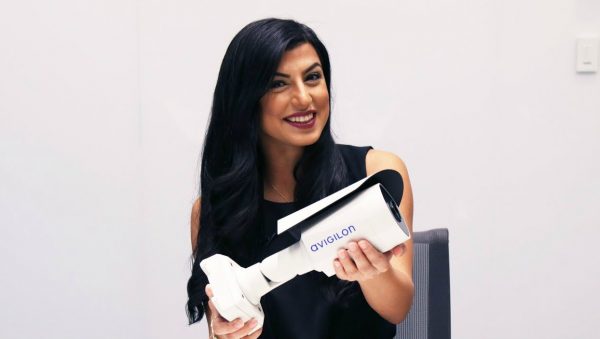 Shay Shariatzadeh posing for a photo with company product