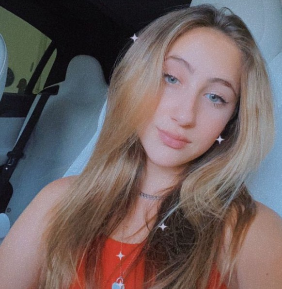 Ava Kolker clicking selfie sitting inside the car. 