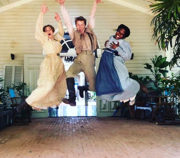 Hayley Atwell posing for a picture along with her co-actors