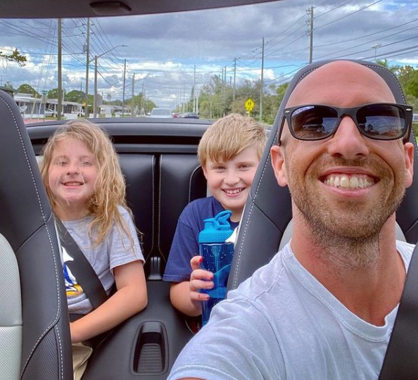 Jen Wilson's ex-husband Blake clicking selfie with their kids while sitting inside the car