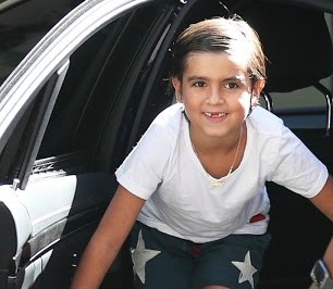 Mason Disick coming out of the car