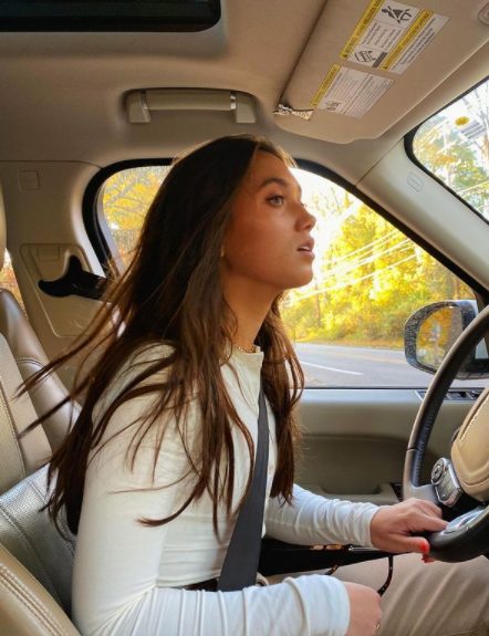 Hannah Meloche driving the car