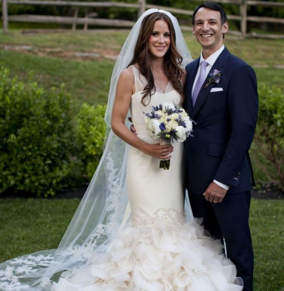 Ashley Biden with her husband in their wedding dress