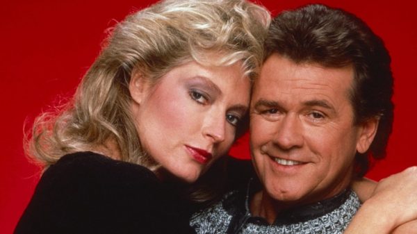 John Reilly posing for photo with his co-actress