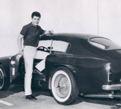  His Late father Ricky Nelson posing with a car