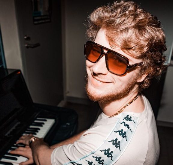 Gravy playing his piano