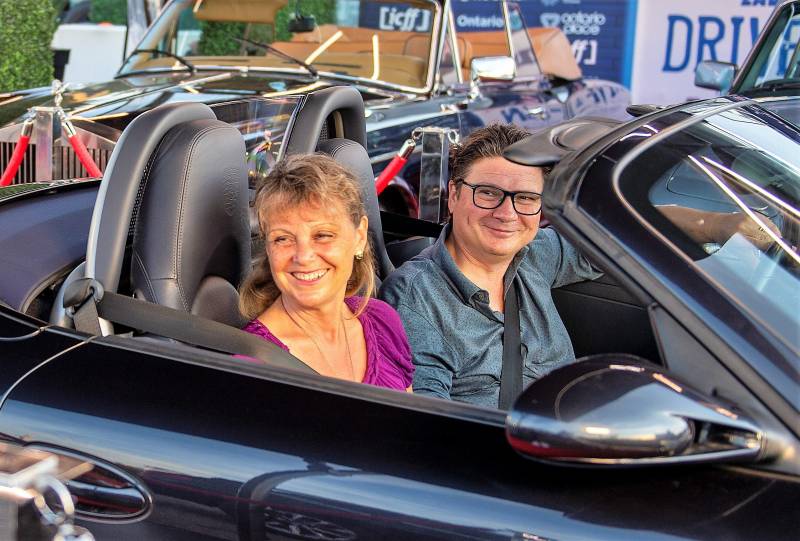 Anna inside the car with her husband Ray