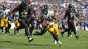 Caption :Caption: Juju Smith -Schuster playing football