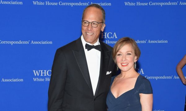 Caption :Lester Holt with his wife