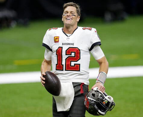 Tom Brady playing for his team