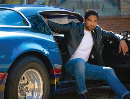 Frankie Elle Rodriguez's father Adam Rodriguez posing for a photo with a car