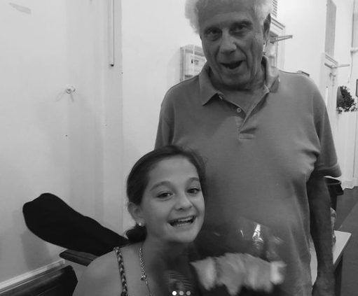 Childhood Photo of Claudia Conway with her grandfather