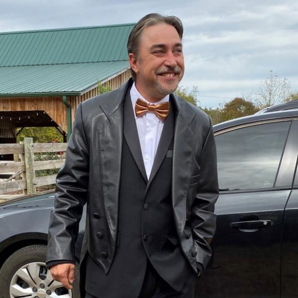 Caption : Steven Ray Tickle with his car