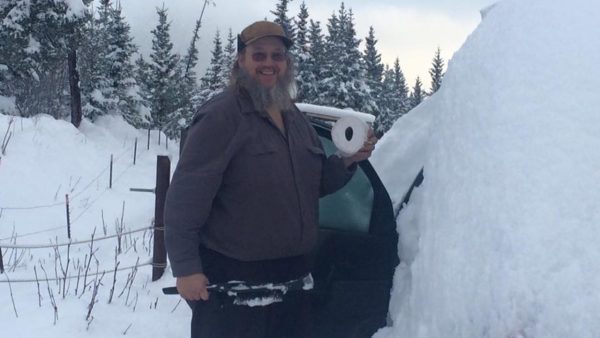 Caption: Shane Kilcher posing the for photo with the snow