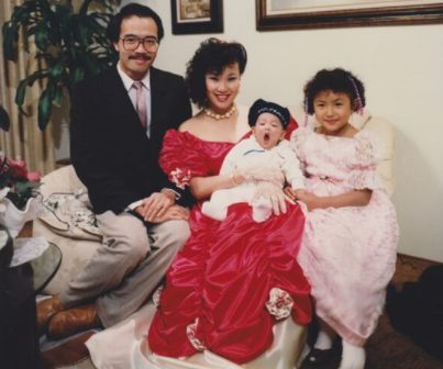Olivia TuTram Mai with her husband James Mai and children 