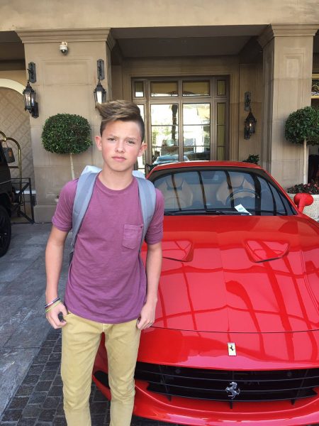 Caption: Jacob Sartorius with car