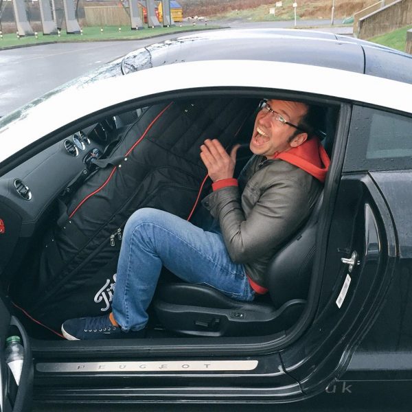 Rick Shiels sitting inside the car