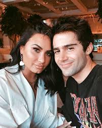 Caption: Demi Lovato with her lover Max Ehrich
