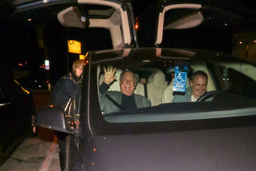 Caption: Neil Sedaka inside the car