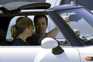 Caption: Nancy Juvonen inside the car with her husband Jimmy Fallon